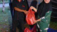 54541-news-pemko-serahkan-bantu